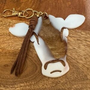 Handcrafted Brown and White Cow Keychain with Leather Tassel